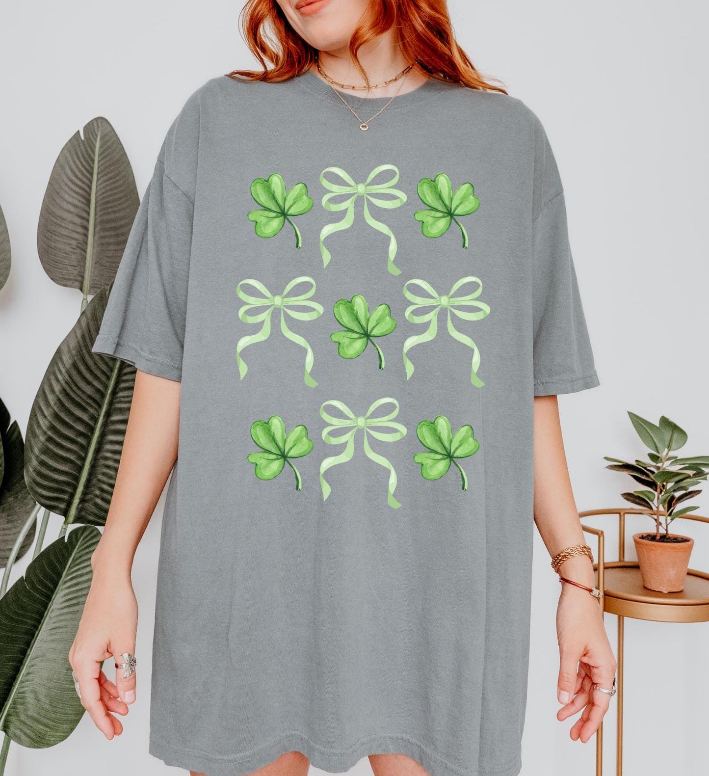 St. Patrick's Day Clover & Bow T-Shirt - Cute Green Shamrock Graphic Tee for Festive and Lucky Vibes!