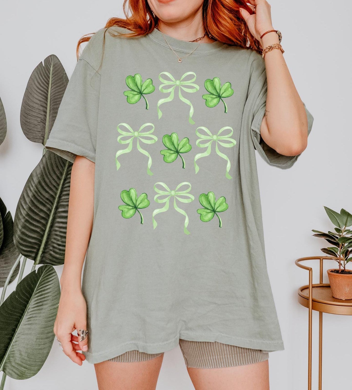 St. Patrick's Day Clover & Bow T-Shirt - Cute Green Shamrock Graphic Tee for Festive and Lucky Vibes!